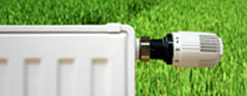 Radiator against green grass